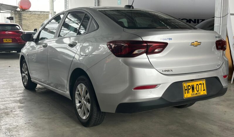 HPW071 CHEVROLET ONIX LTZ TURBO AC 1.0 4P 4X2 AT MODELO: 2022 lleno