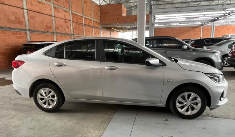 HPW071 CHEVROLET ONIX LTZ TURBO AC 1.0 4P 4X2 AT MODELO: 2022 lleno