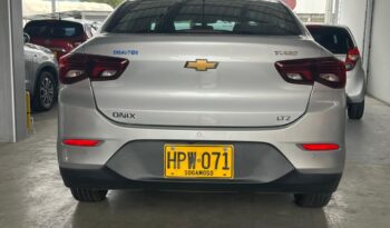 HPW071 CHEVROLET ONIX LTZ TURBO AC 1.0 4P 4X2 AT MODELO: 2022 lleno